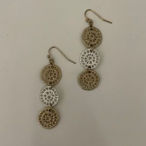 Gold and silver dangling earrings
